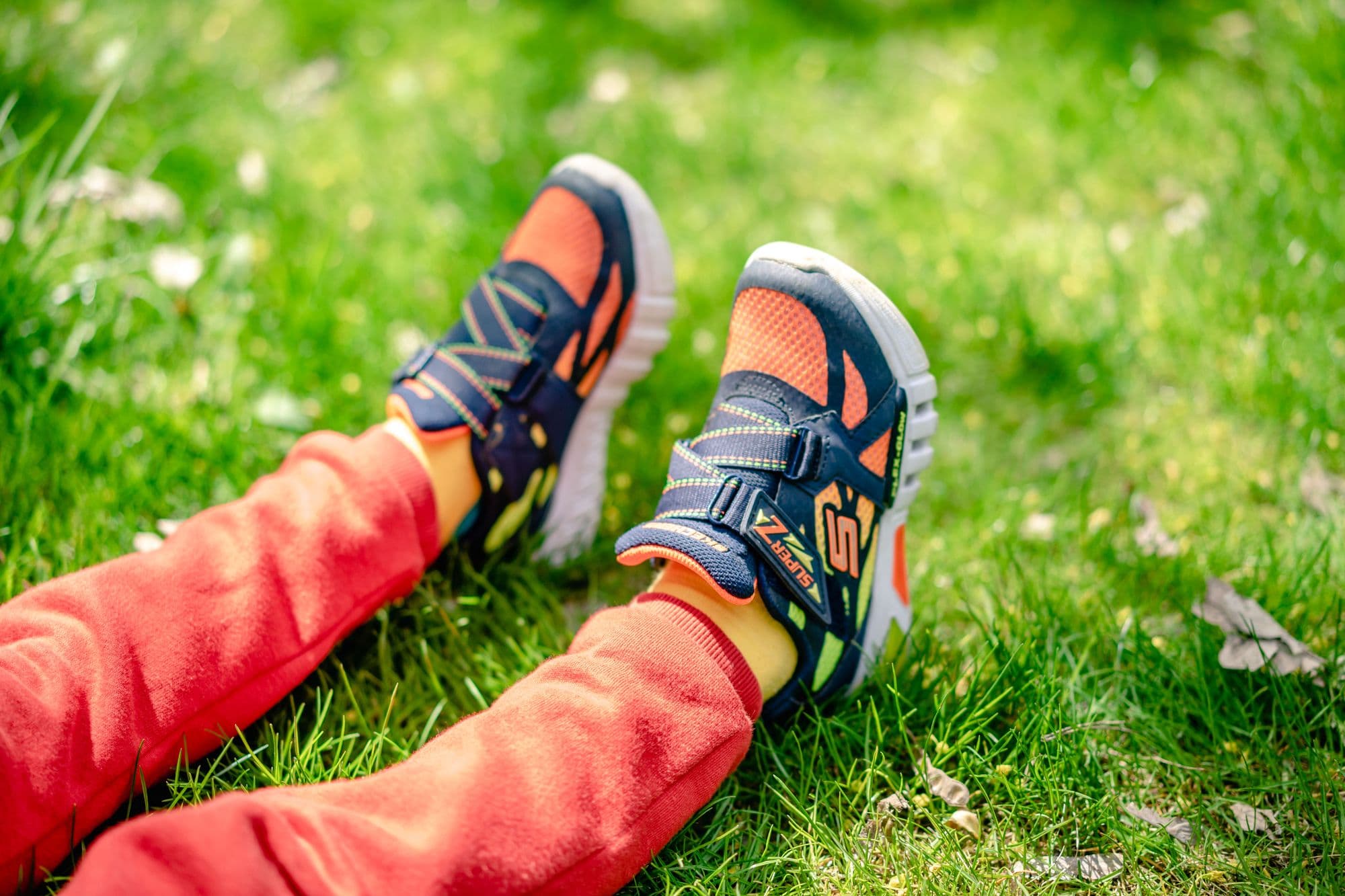 Real children's shoes photographed outdoors